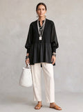 Ribbed Peplum Mixed-Media Tunic - Black Split V-Neck Bishop Sleeve Blouse
