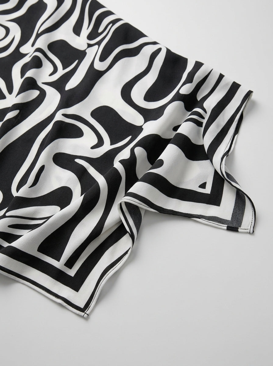 Casual Abstract Swirl Print Asymmetric Hem Top in Black and White - Round Neck Long Sleeve Blouse